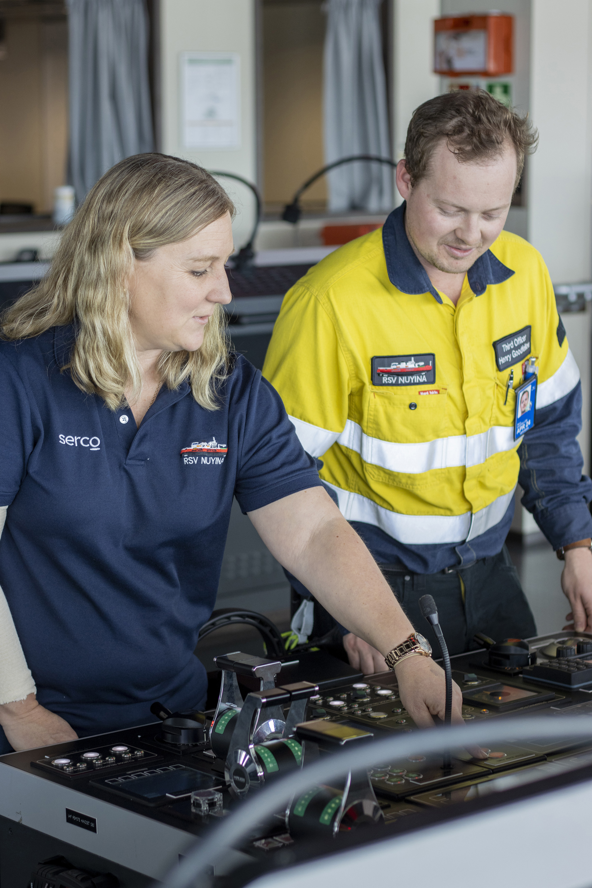 Photo of AMC graduates Katrina Beams (2nd Officer) and Henry Goodfellow (Chief Off icer) aboard Australia’s new icebreaker, RSV Nuyina Photo: Peter Allen